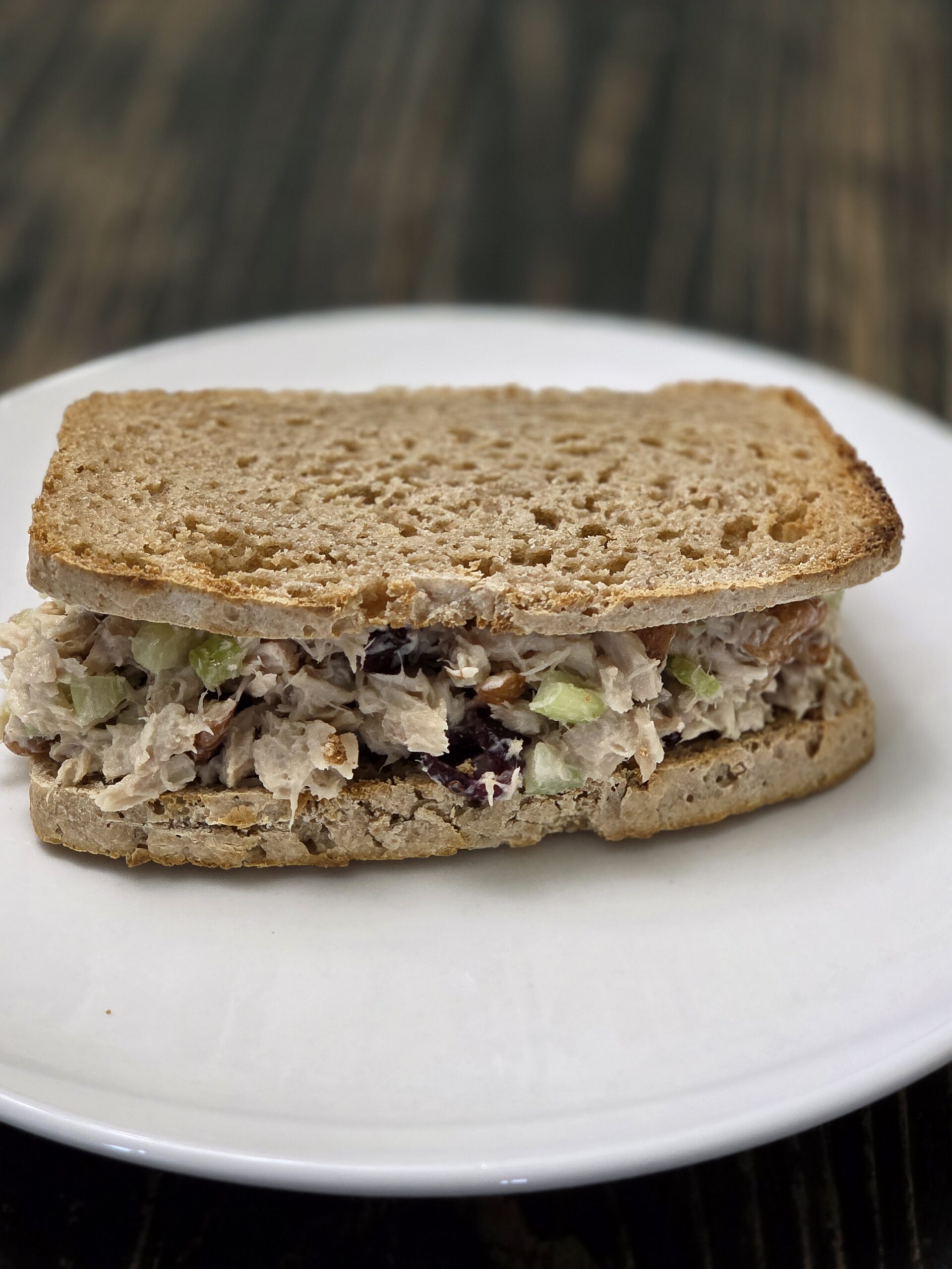 tuna fish salad sandwich on sourdough bread