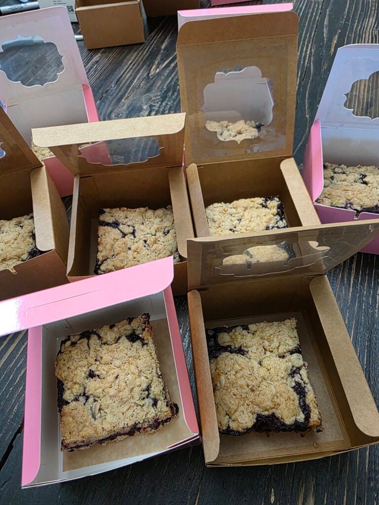 pictures of crumble bars getting packaged for a farmstand